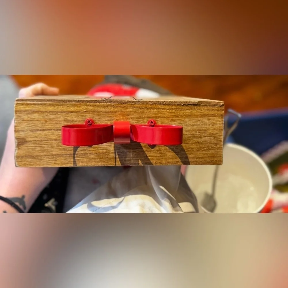 Elegant Brown Wooden Wall Shelf with Red Accents